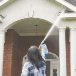 Cleaning stucco and brick home with Wet and Forget