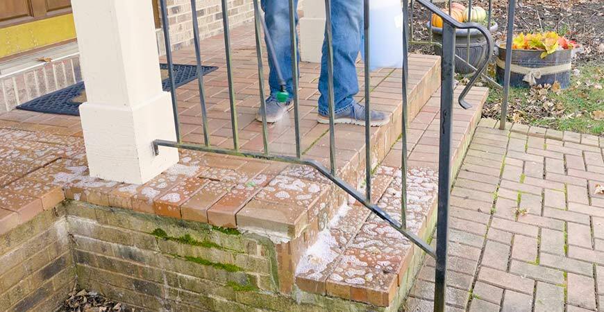 Clean your brick patio with Wet & Forget, the easy no scrub cleaner.