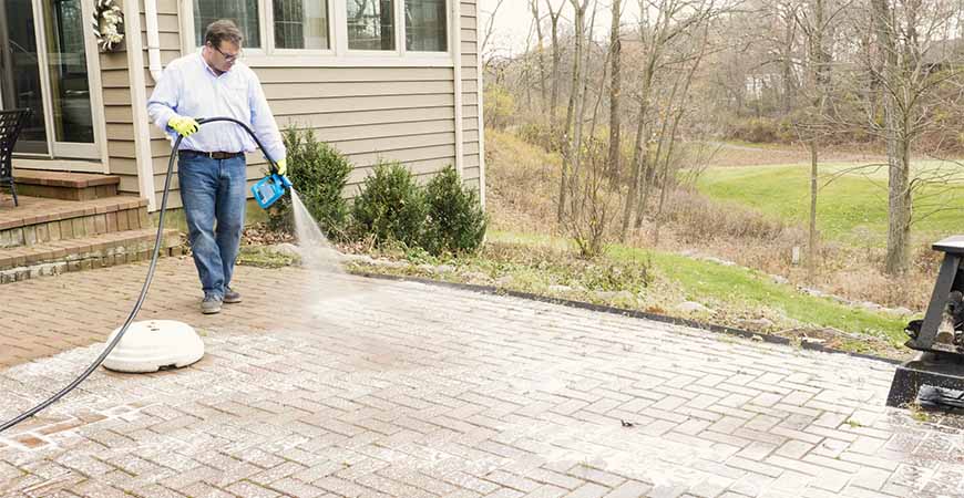 Use Wet & Forget Xtreme Reach Hose End for spring cleaning your patio.