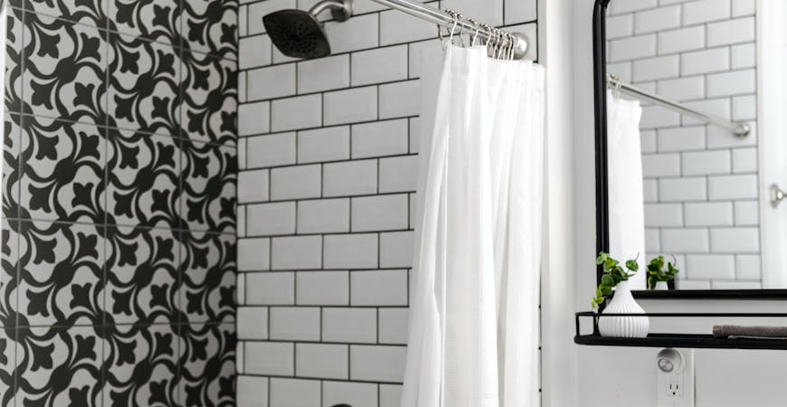 A shower curtain can get scummy and smelly.